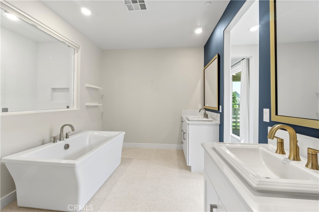 156 Chorus Irvine, CA 92618 - Photo 21 of 45 a bathroom with a sink and a bathtub