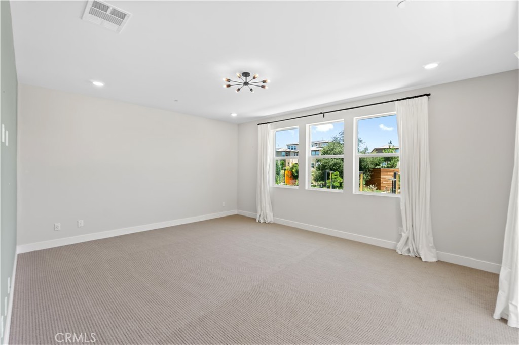 156 Chorus Irvine, CA 92618 - Photo 25 of 45 an empty room with a window