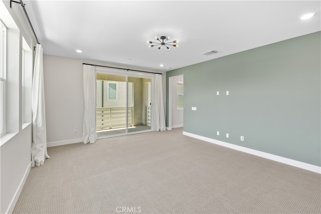 156 Chorus Irvine, CA 92618 - Photo 26 of 45 a view of an empty room with a window
