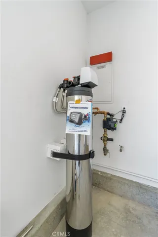 a bathroom with a light fixture and a stove