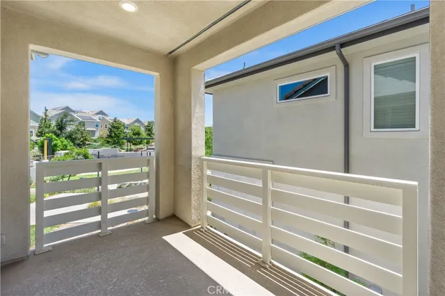 a view of a closet area with an empty room