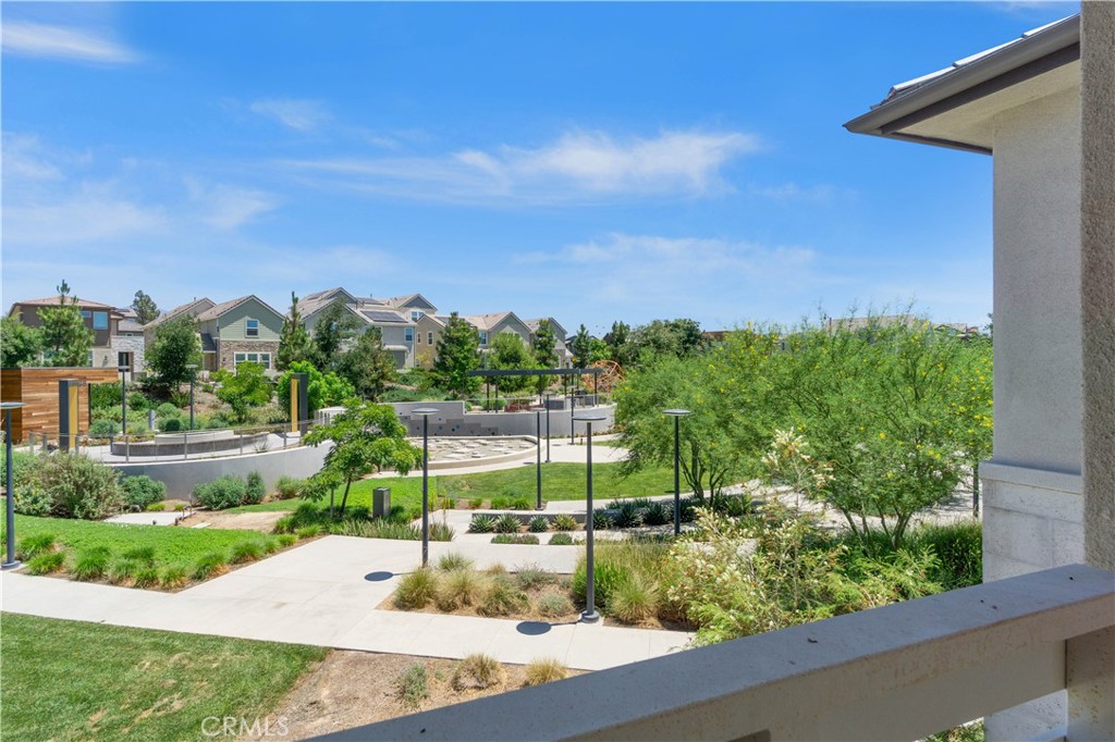 156 Chorus Irvine, CA 92618 - Photo 35 of 45 a view of a swimming pool with a garden