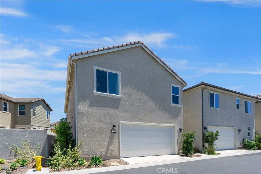 156 Chorus Irvine, CA 92618 - Photo 40 of 45 a view of a house with a yard