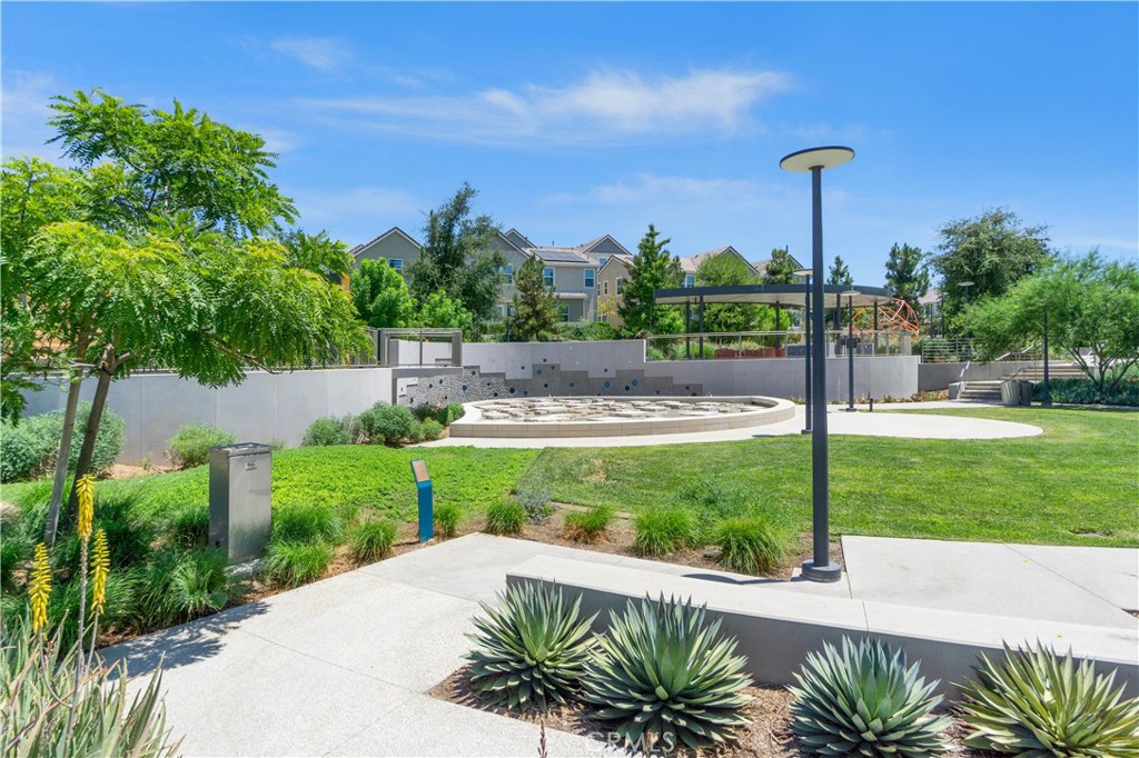 156 Chorus Irvine, CA 92618 - Photo 42 of 45 a house view with a garden space
