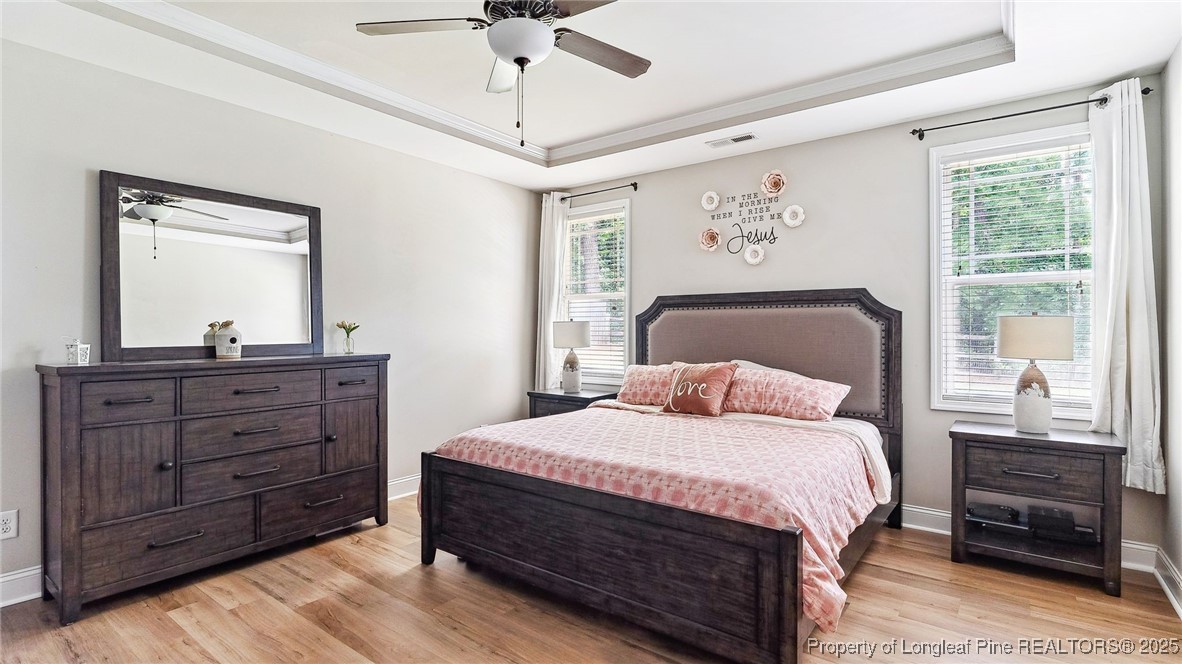 75 Bynum Court Carthage, NC 28327 - Photo 19 of 49 a bedroom with a bed and a window