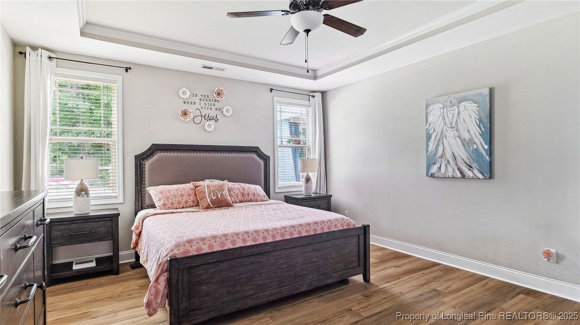 75 Bynum Court Carthage, NC 28327 - Photo 20 of 49 a bedroom with a large bed and a window