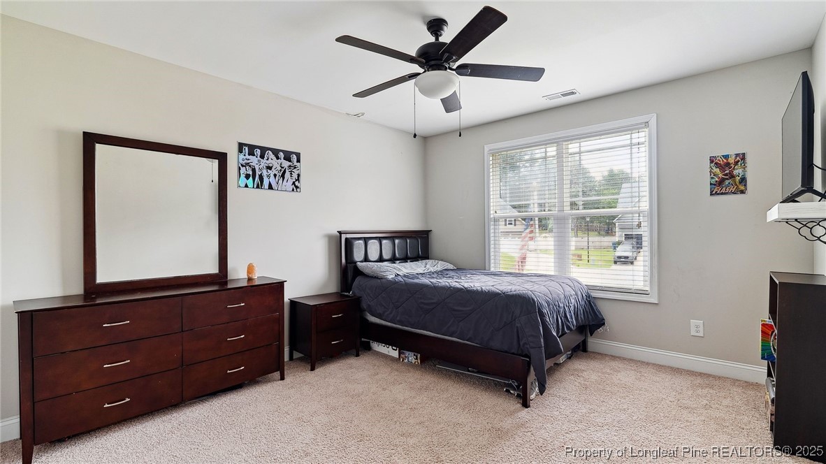 75 Bynum Court Carthage, NC 28327 - Photo 26 of 49 a bed room with a bed and a window