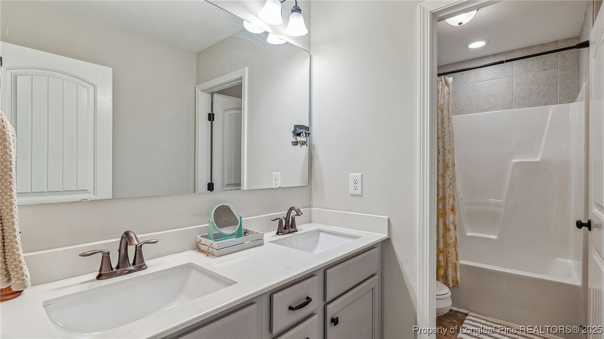 75 Bynum Court Carthage, NC 28327 - Photo 28 of 49 a bathroom with a sink and a mirror