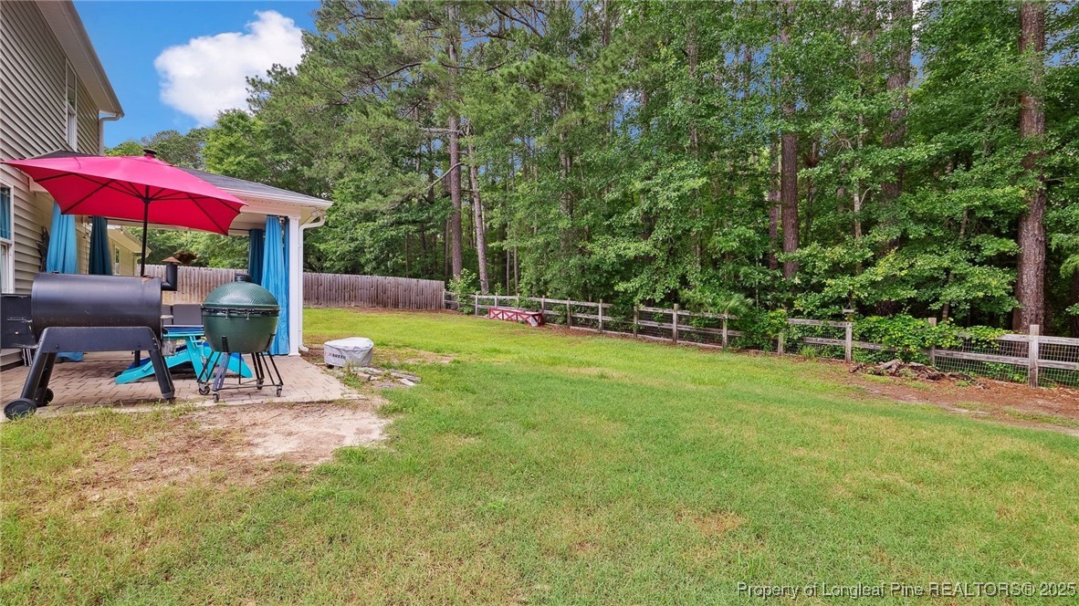 75 Bynum Court Carthage, NC 28327 - Photo 38 of 49 a view of outdoor space yard deck patio and outdoor kitchen