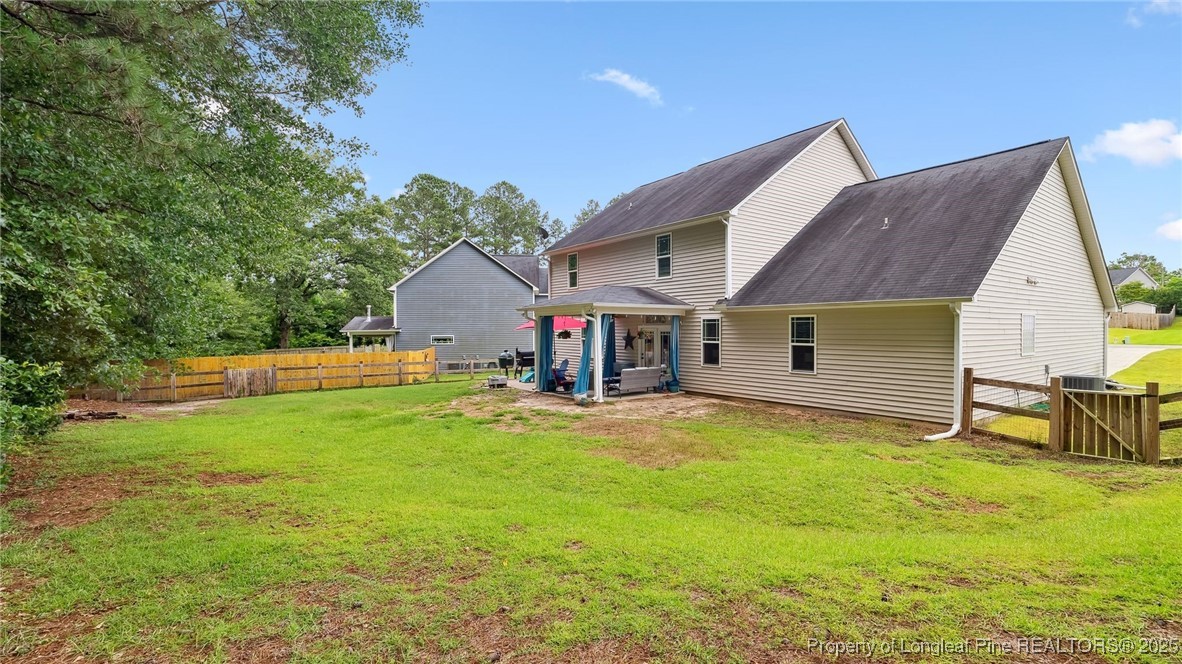 75 Bynum Court Carthage, NC 28327 - Photo 45 of 49 a view of a house with backyard and a tree