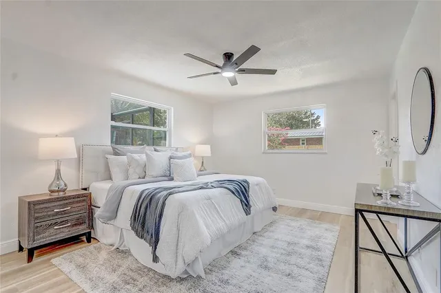 a house view with swimming pool in front of it