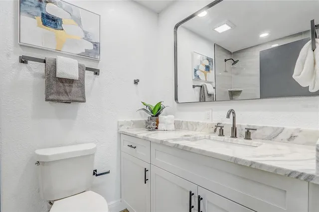 a view of a yard with a large tree