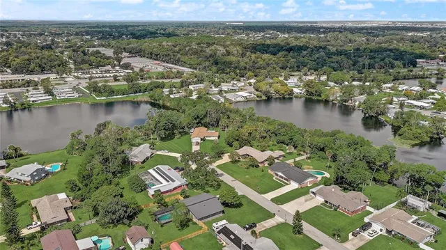 an aerial view of a house with a garden