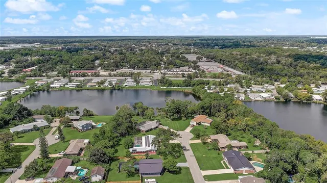 an aerial view of a house with a garden