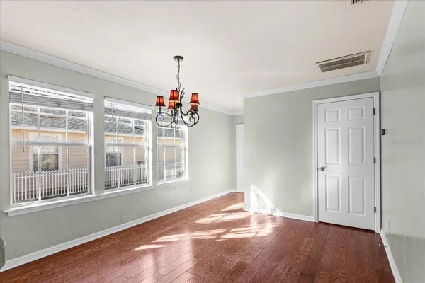 a view of livingroom with furniture wooden floor and window