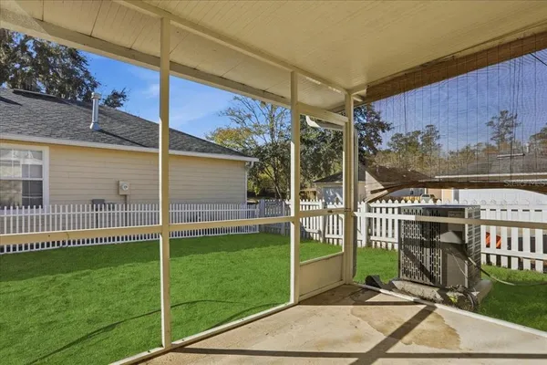 a view of a porch with a backyard