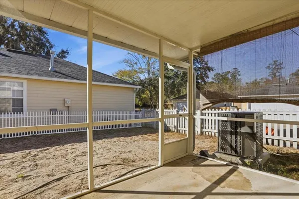a view of a balcony with a potted plant