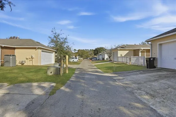 a view of a house with a big yard