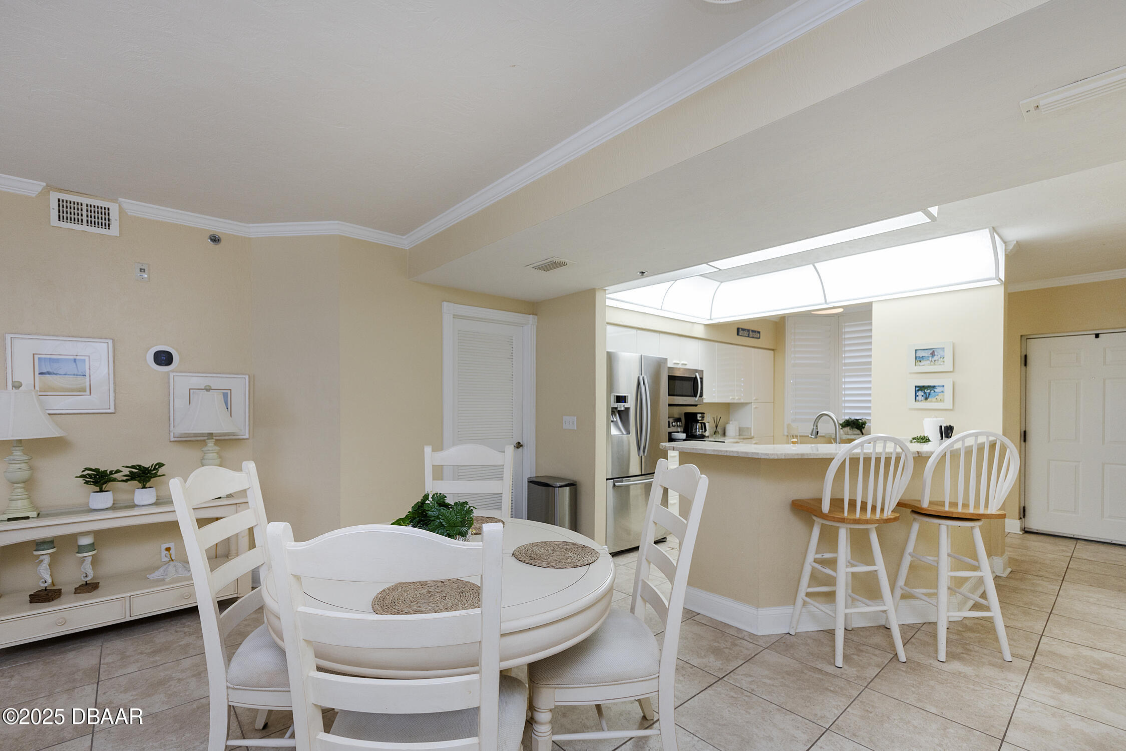4545 South Atlantic Avenue, Unit 3704 Ponce Inlet, FL 32127 - Photo 11 of 66 a view of a dining room with furniture