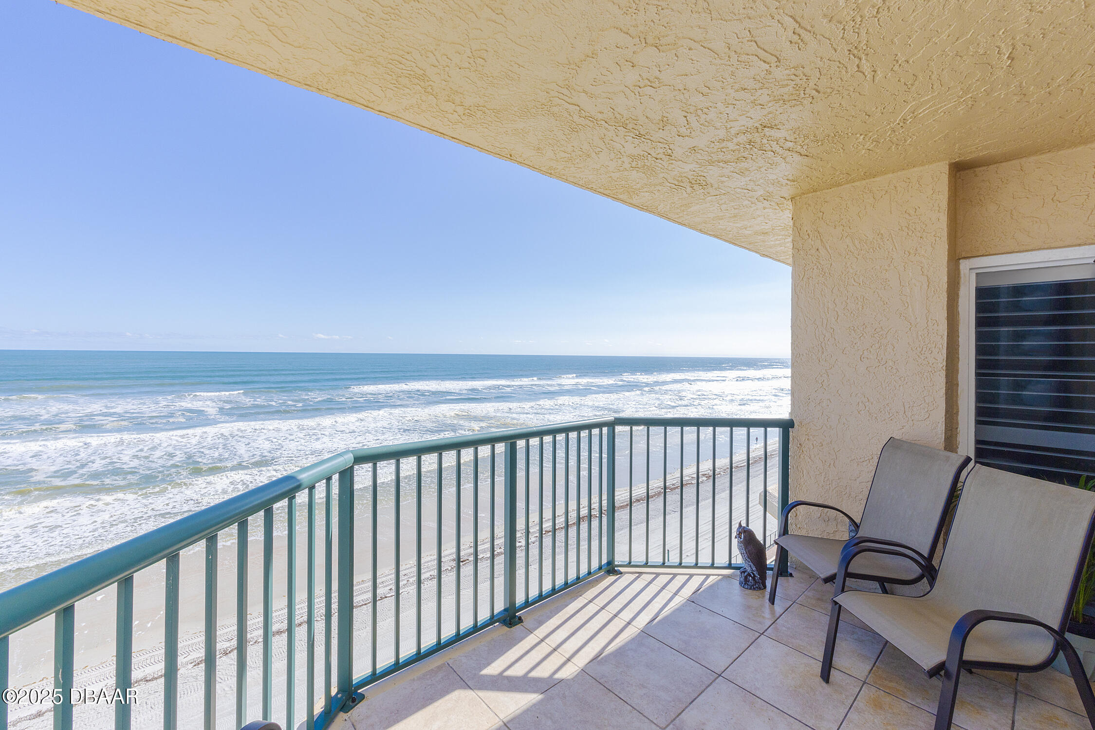 4545 South Atlantic Avenue, Unit 3704 Ponce Inlet, FL 32127 - Photo 22 of 66 a view of a balcony with chair and table