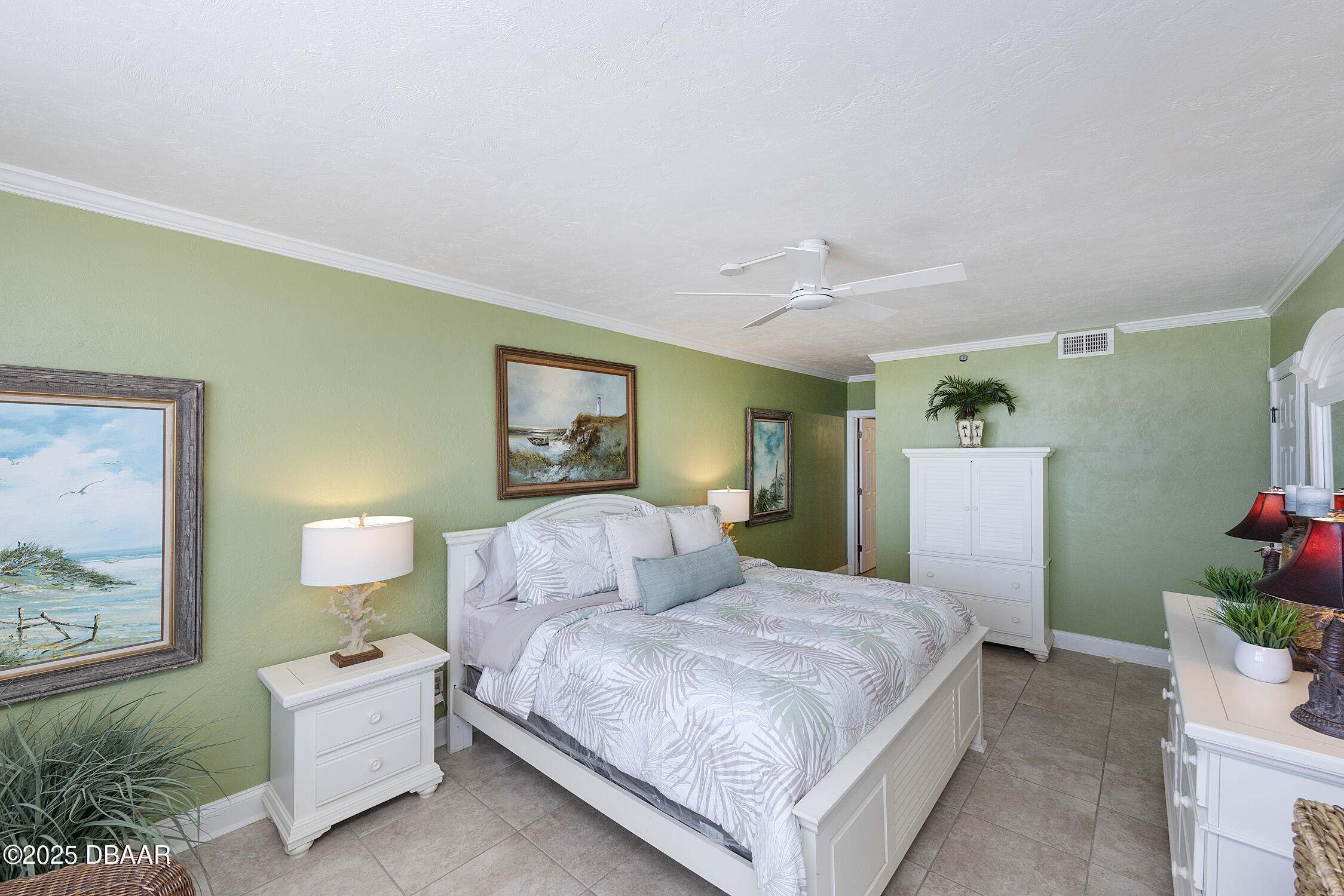 4545 South Atlantic Avenue, Unit 3704 Ponce Inlet, FL 32127 - Photo 26 of 66 a bedroom with a bed potted plant and a window