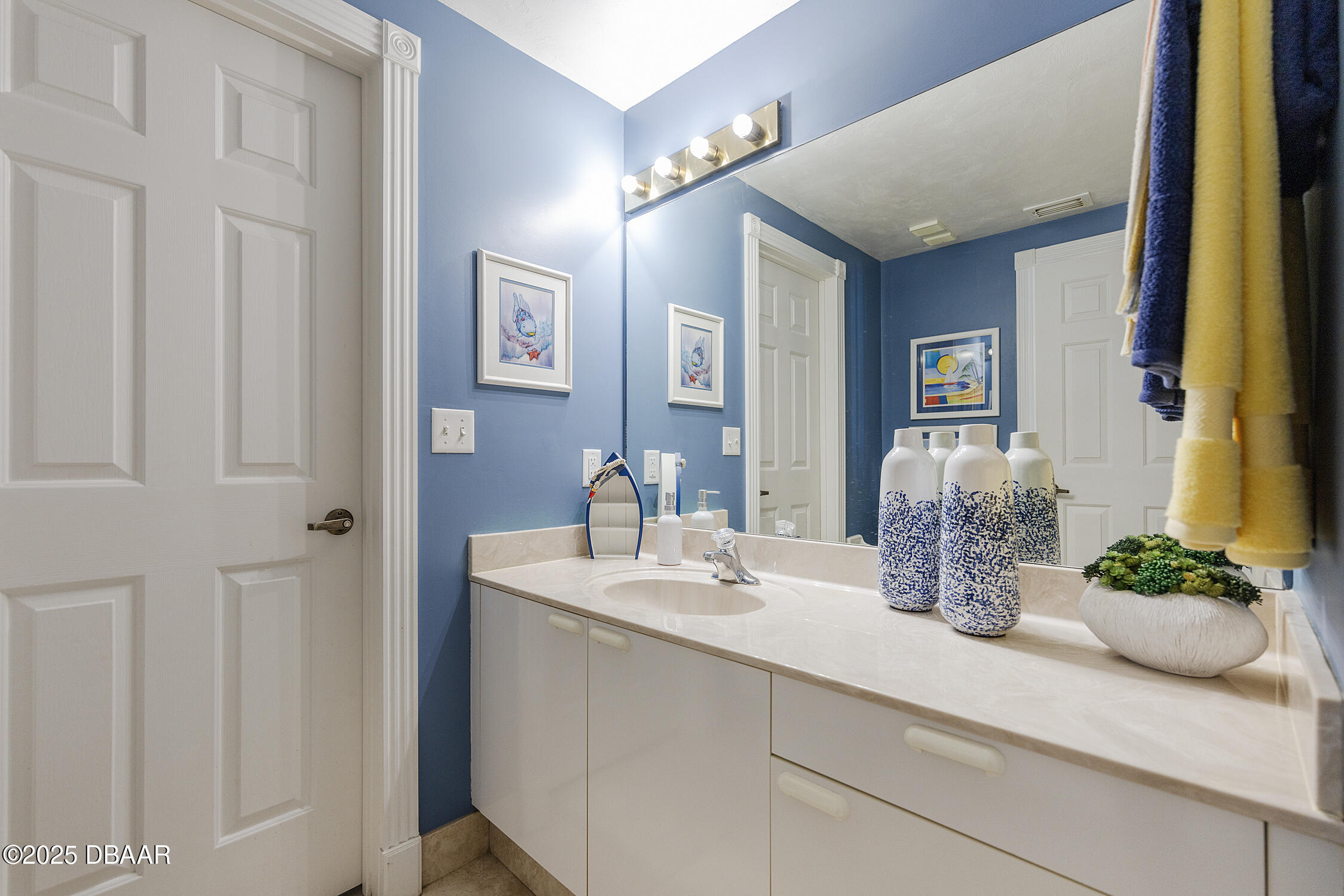 4545 South Atlantic Avenue, Unit 3704 Ponce Inlet, FL 32127 - Photo 42 of 66 a bathroom with a sink a mirror and a shower