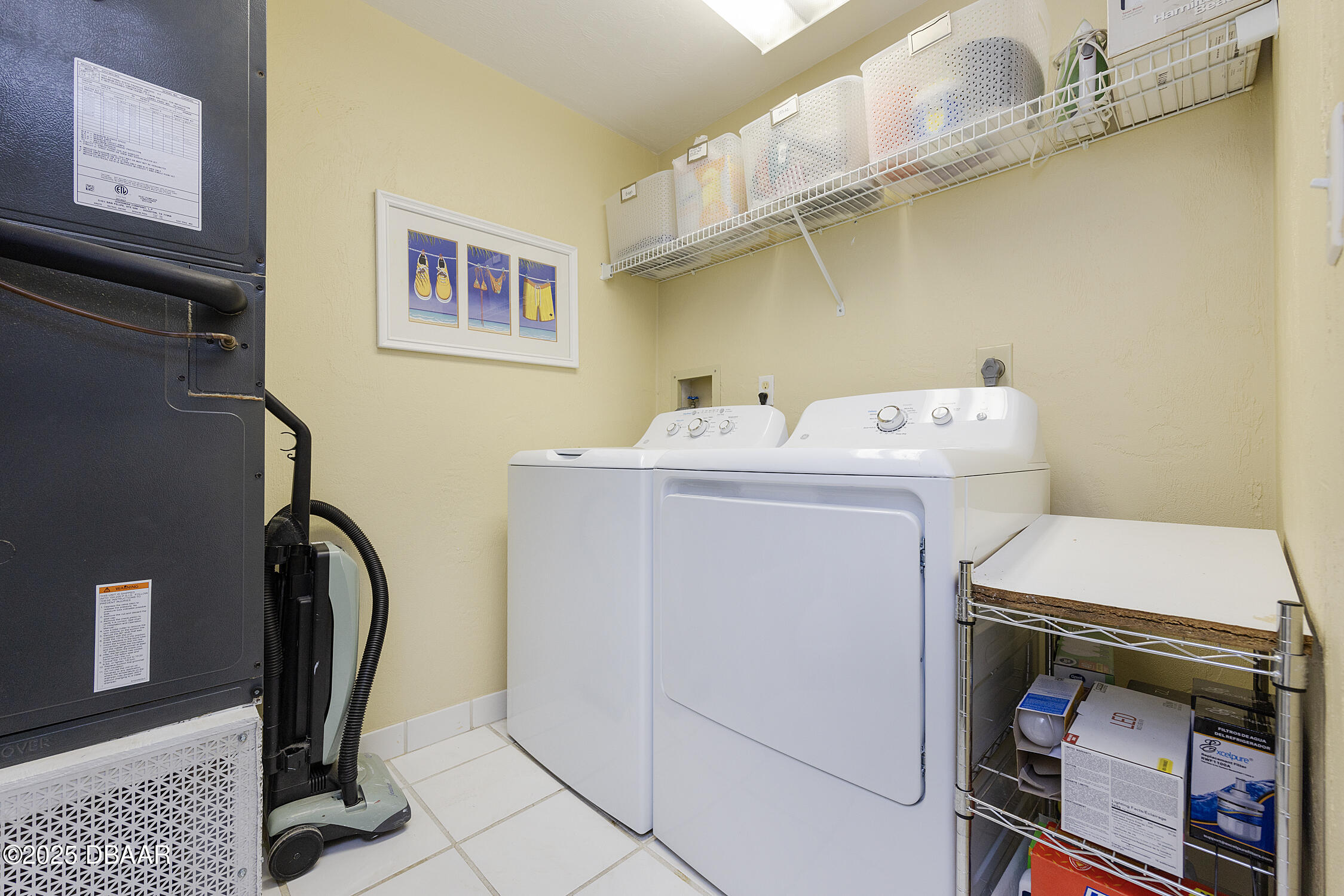 4545 South Atlantic Avenue, Unit 3704 Ponce Inlet, FL 32127 - Photo 44 of 66 a utility room with dryer and washer