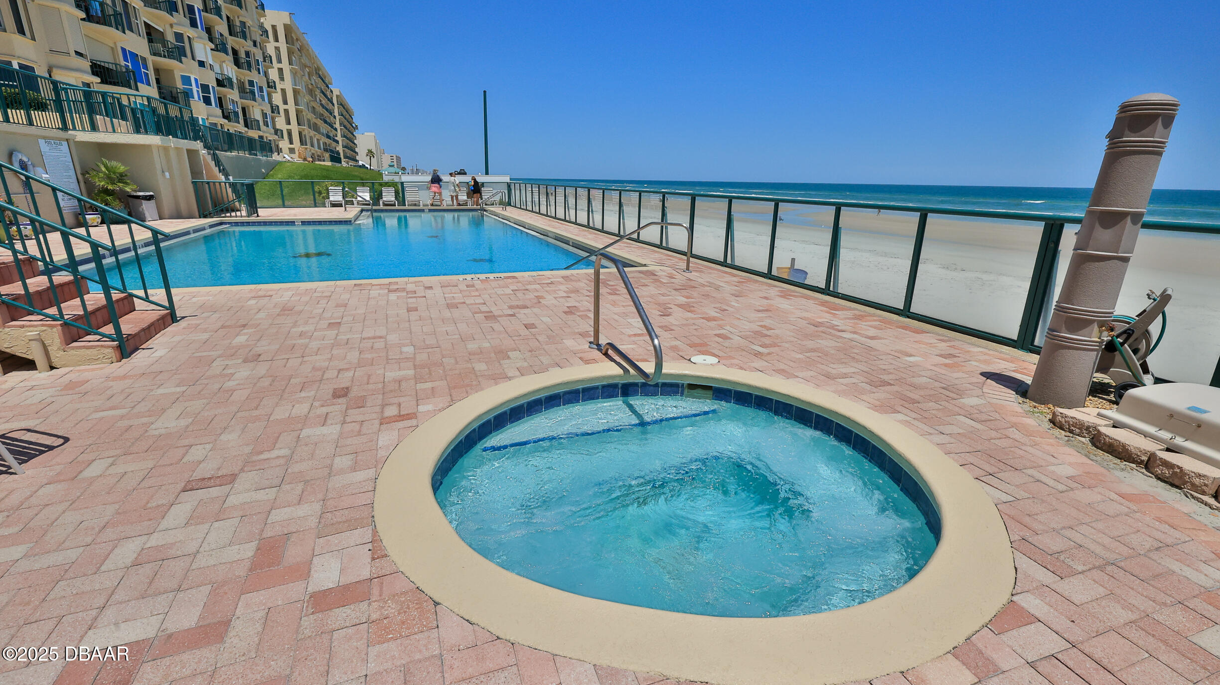 4545 South Atlantic Avenue, Unit 3704 Ponce Inlet, FL 32127 - Photo 54 of 66 a view of a swimming pool with a patio