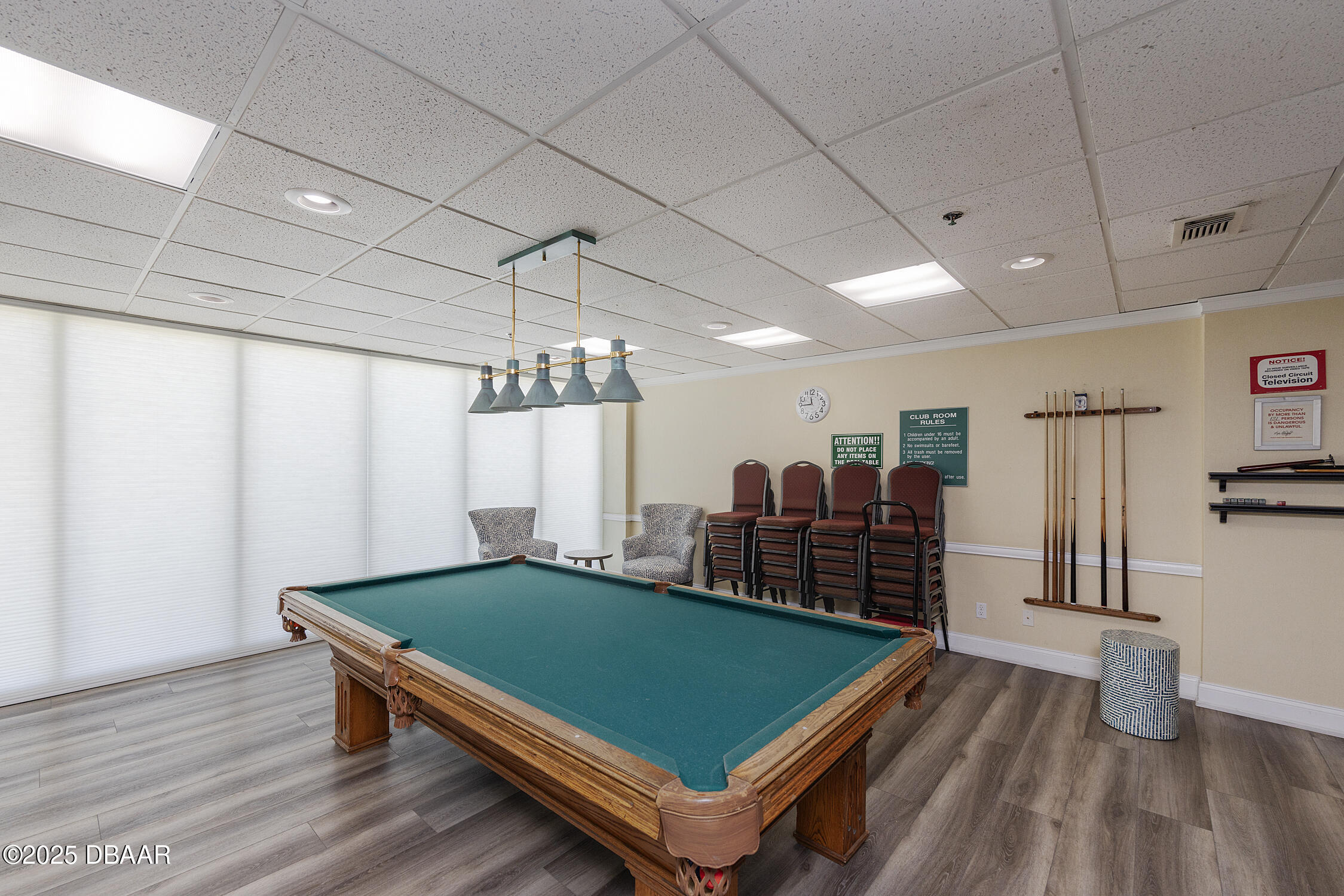 4545 South Atlantic Avenue, Unit 3704 Ponce Inlet, FL 32127 - Photo 60 of 66 a room with wooden floors and pool table