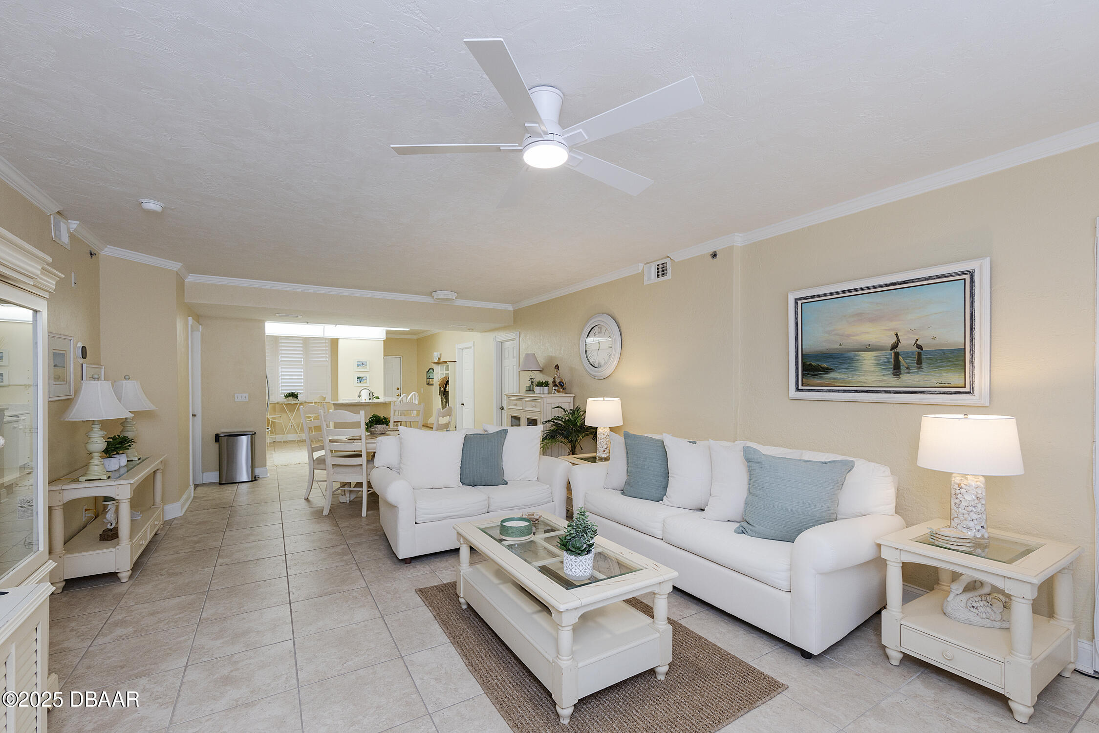 4545 South Atlantic Avenue, Unit 3704 Ponce Inlet, FL 32127 - Photo 10 of 66 a living room with furniture and a large window
