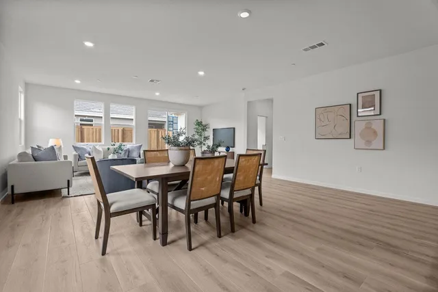 a kitchen with kitchen island granite countertop a sink and counter space
