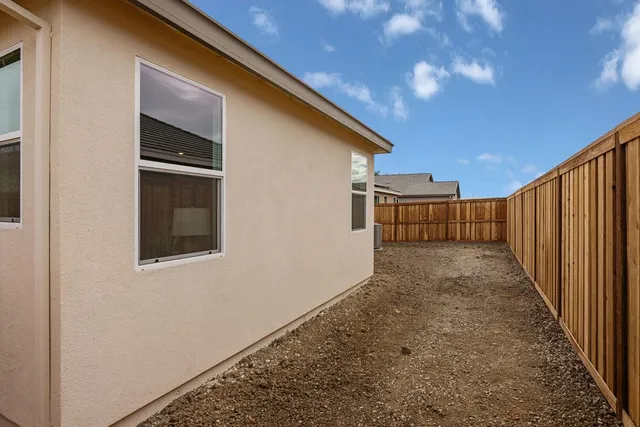 a view of a backyard with stairs