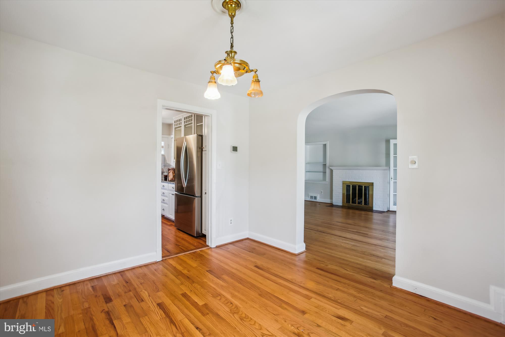5909 Frederick Street Springfield, VA 22150 - Photo 16 of 62 a view of a room with wooden floor and staircase