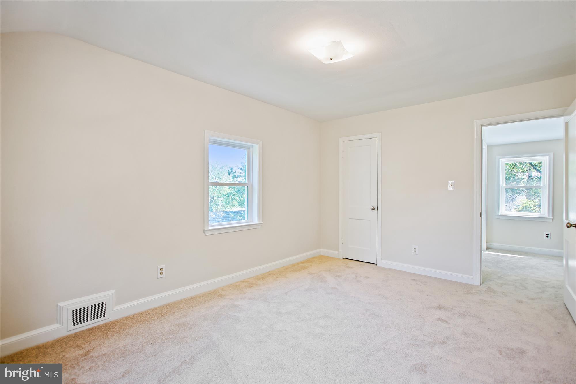 5909 Frederick Street Springfield, VA 22150 - Photo 26 of 62 an empty room with windows