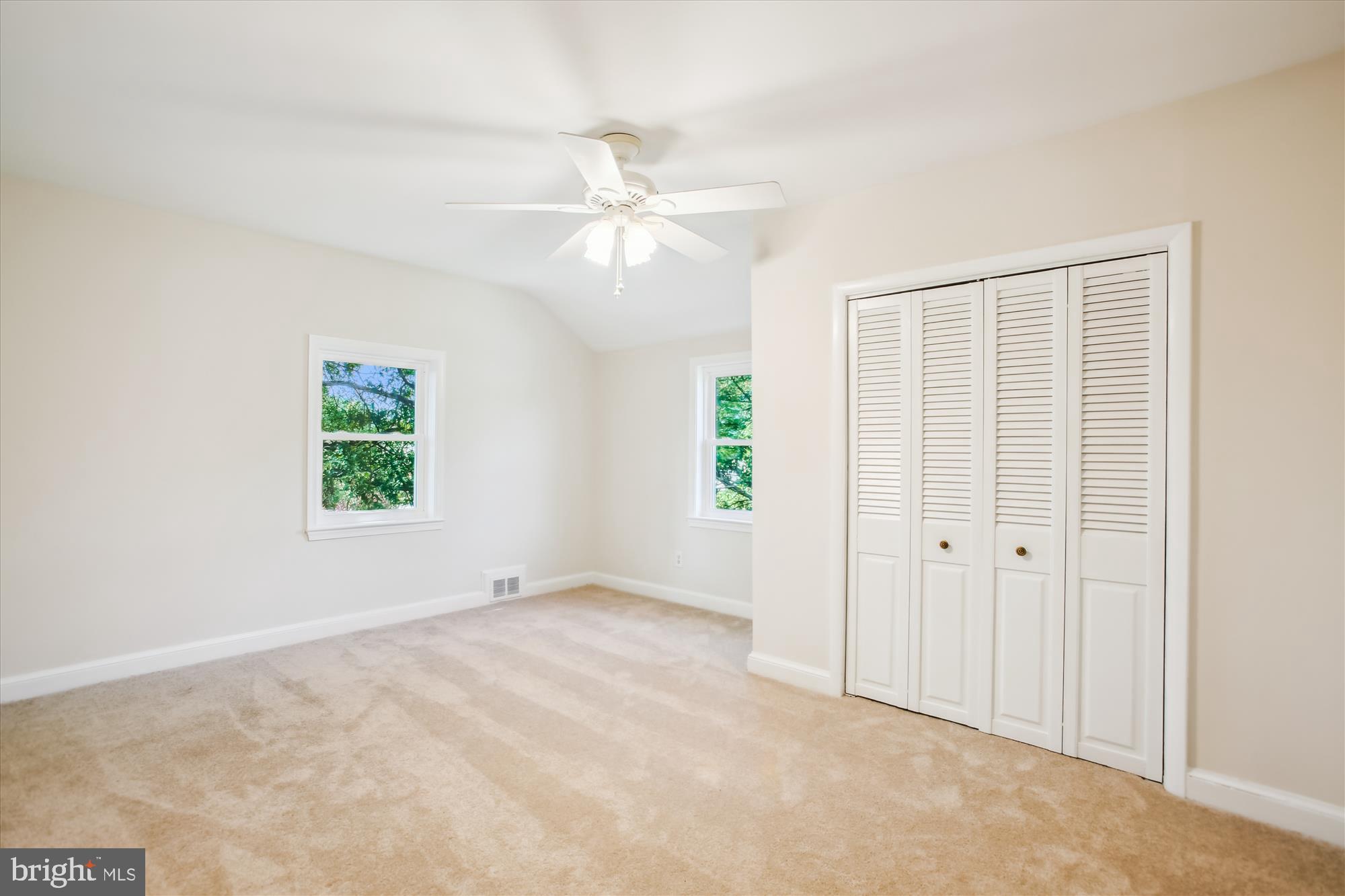 5909 Frederick Street Springfield, VA 22150 - Photo 30 of 62 an empty room with windows and fan
