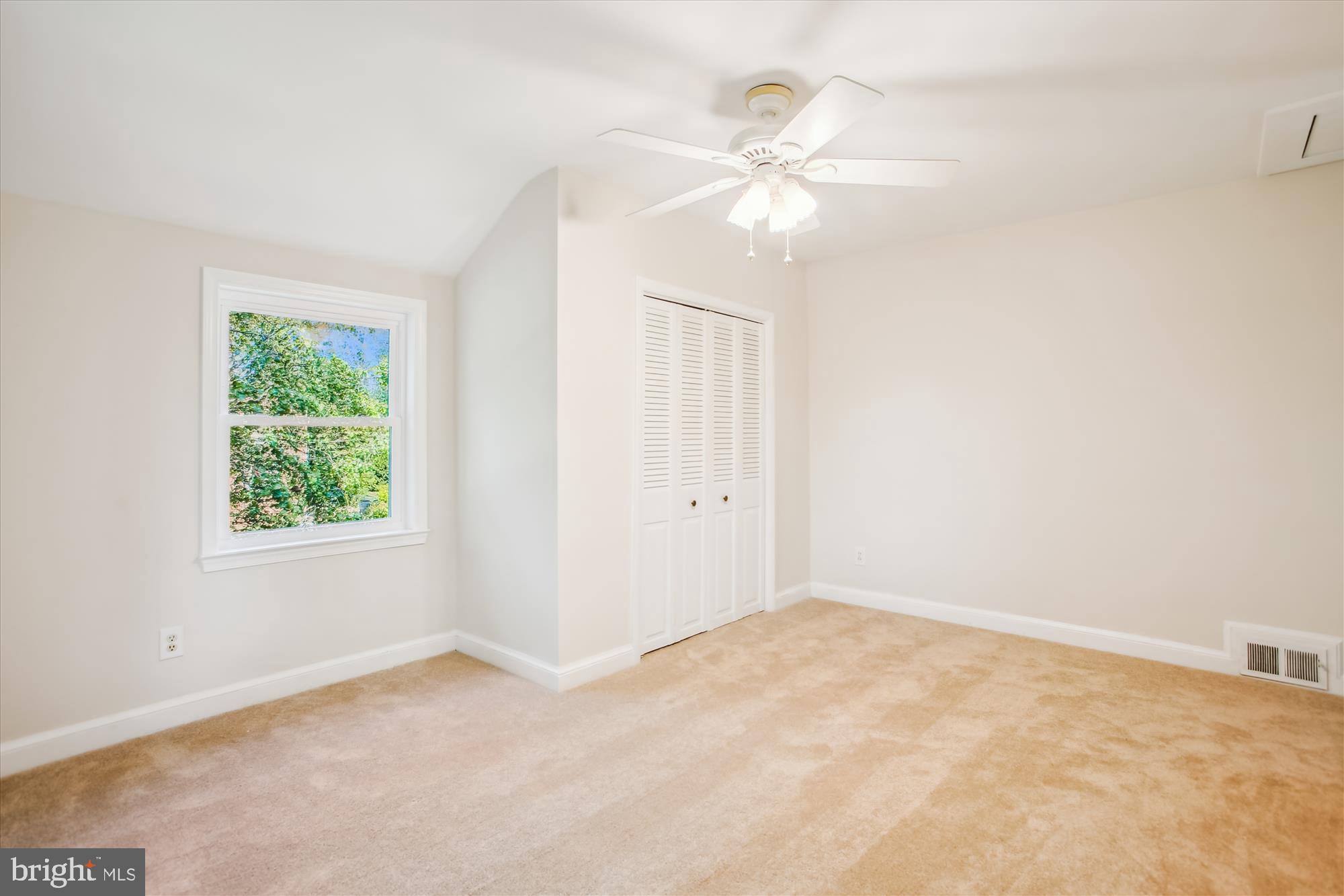 5909 Frederick Street Springfield, VA 22150 - Photo 31 of 62 an empty room with windows and fan