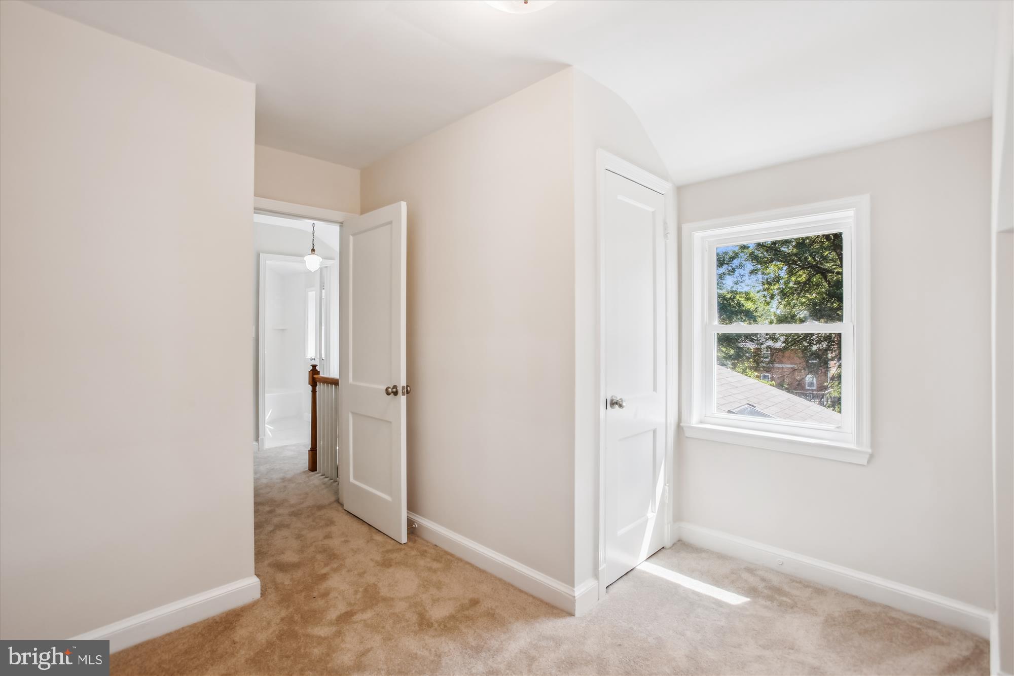 5909 Frederick Street Springfield, VA 22150 - Photo 32 of 62 a view of an empty room with closet and a window