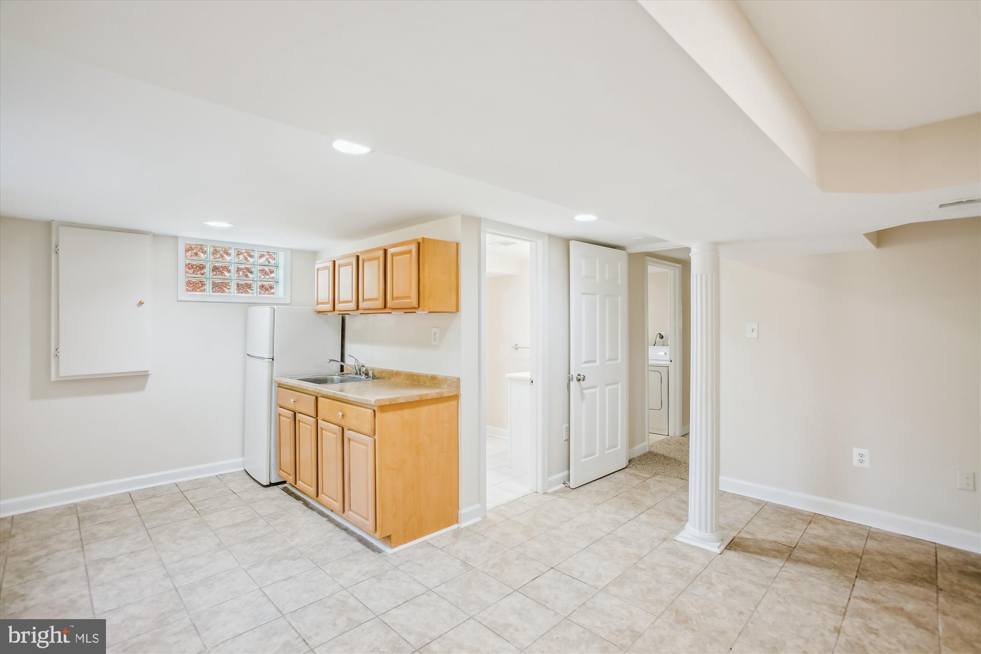 5909 Frederick Street Springfield, VA 22150 - Photo 40 of 62 a spacious bathroom with stainless steel appliances granite countertop a granite counter tops and a view of living room