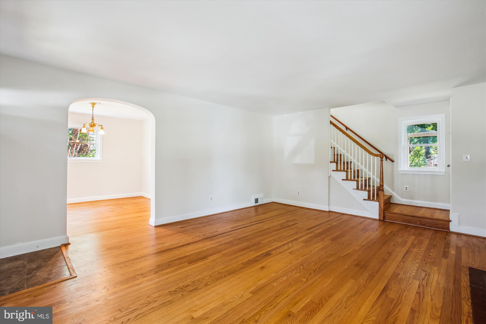 5909 Frederick Street Springfield, VA 22150 - Photo 4 of 62 a view of empty room with wooden floor