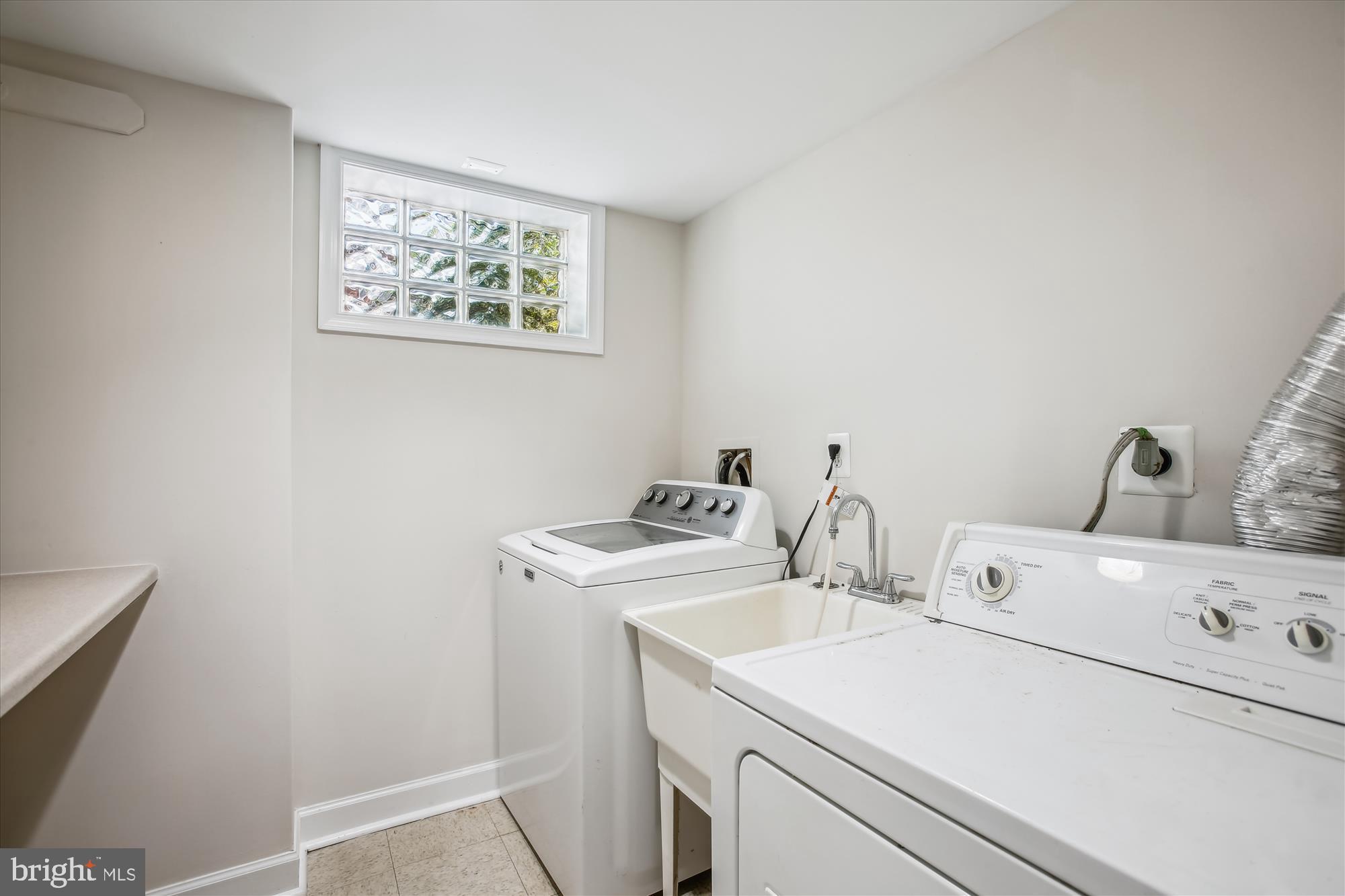 5909 Frederick Street Springfield, VA 22150 - Photo 44 of 62 a utility room with dryer and washer