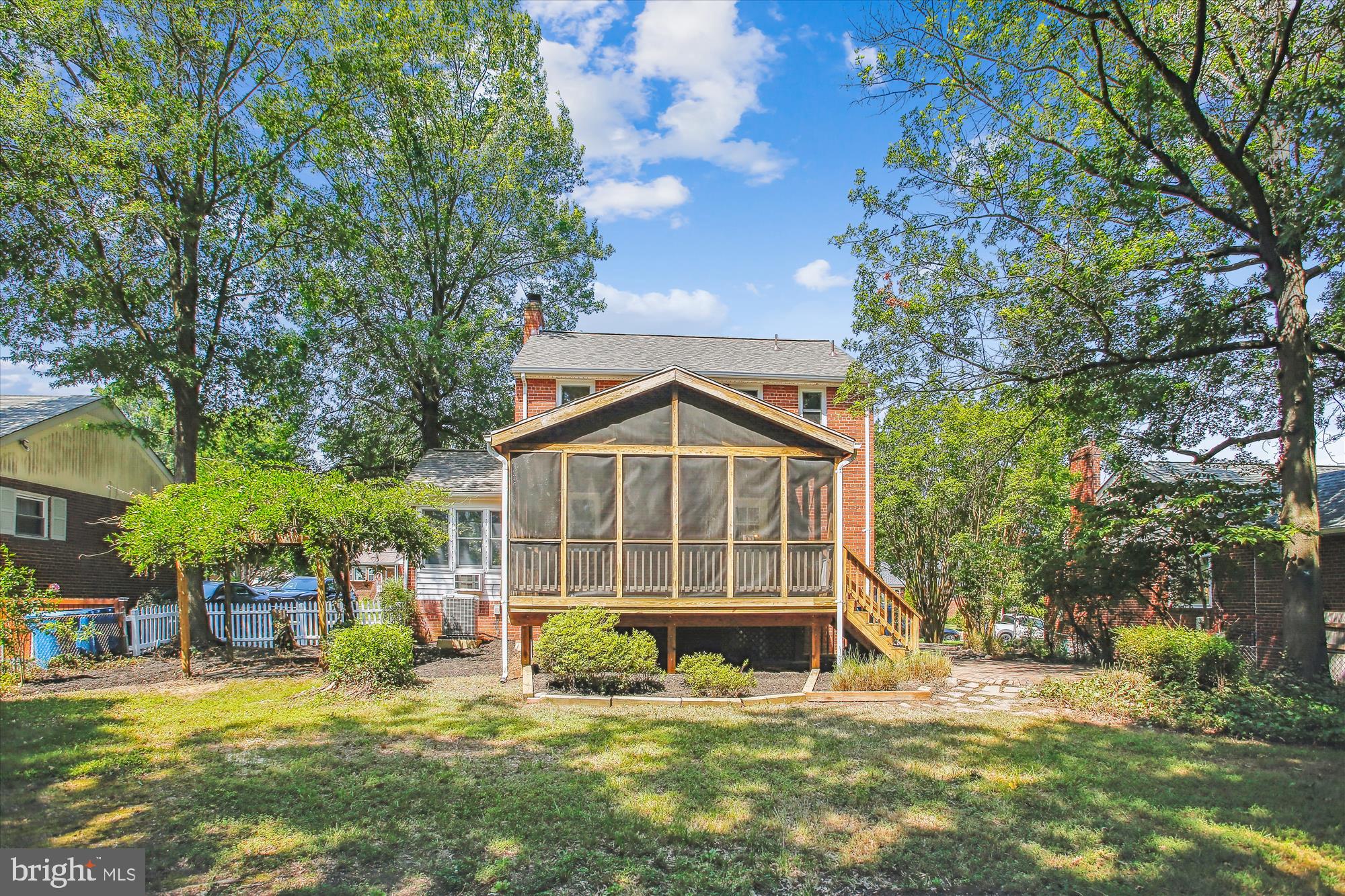 5909 Frederick Street Springfield, VA 22150 - Photo 51 of 62 a view of a house with backyard and sitting area