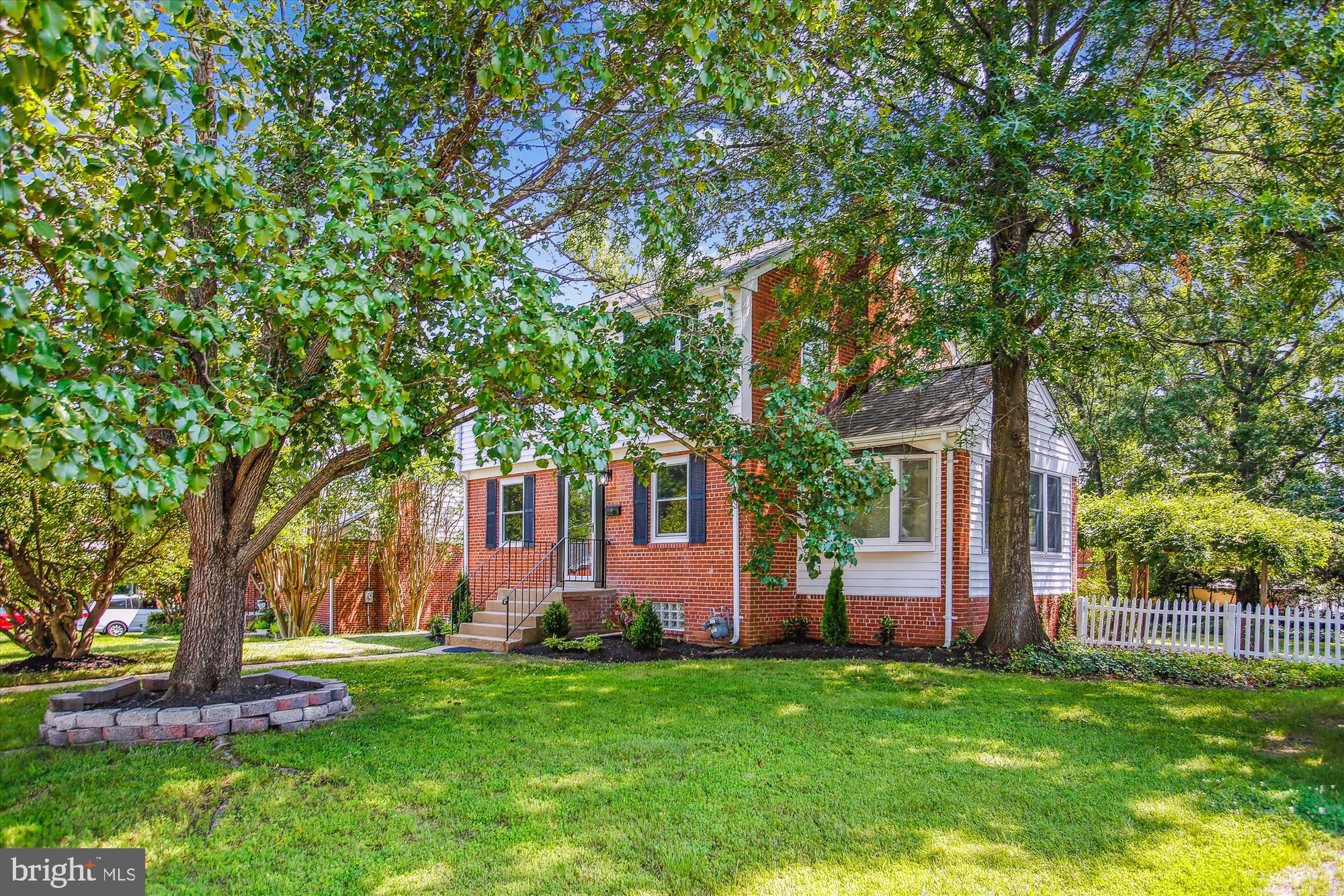 5909 Frederick Street Springfield, VA 22150 - Photo 55 of 62 front view of a house with a tree