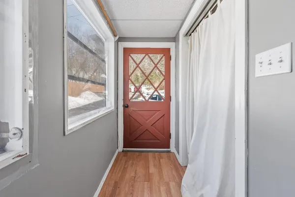 a kitchen with stainless steel appliances granite countertop a refrigerator sink and cabinets