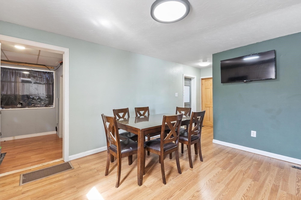 7 Jackson Street Gardner, MA 01440 - Photo 7 of 24 a view of a dining room with furniture and wooden floor