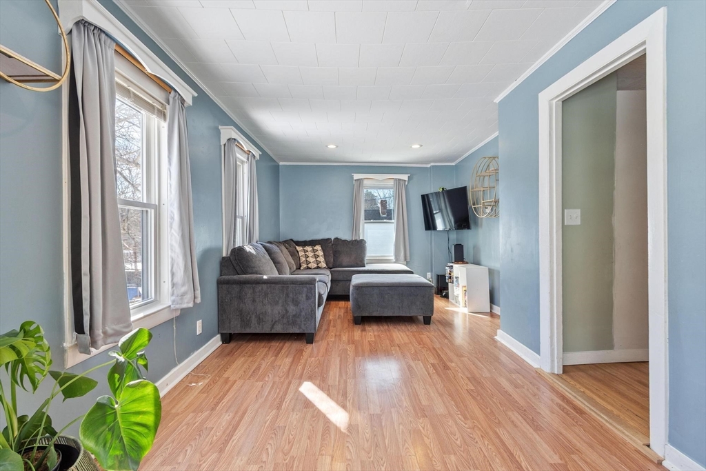 7 Jackson Street Gardner, MA 01440 - Photo 9 of 24 a living room with furniture and a wooden floor