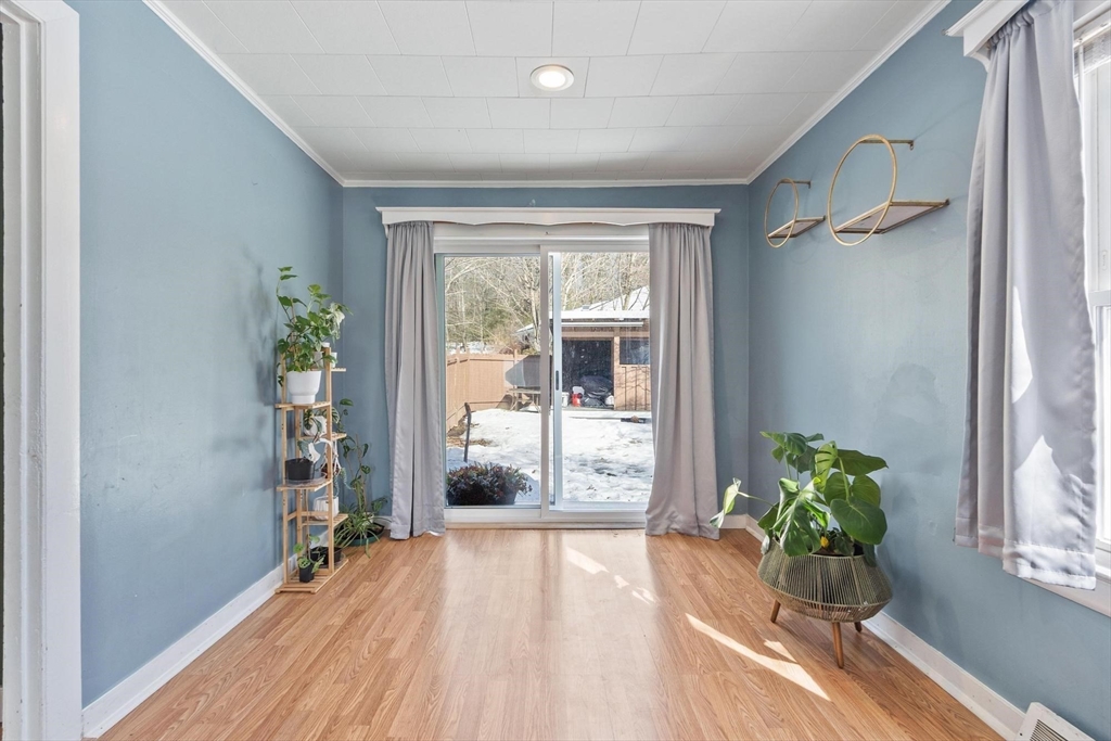 7 Jackson Street Gardner, MA 01440 - Photo 10 of 24 a room with window and a potted plant