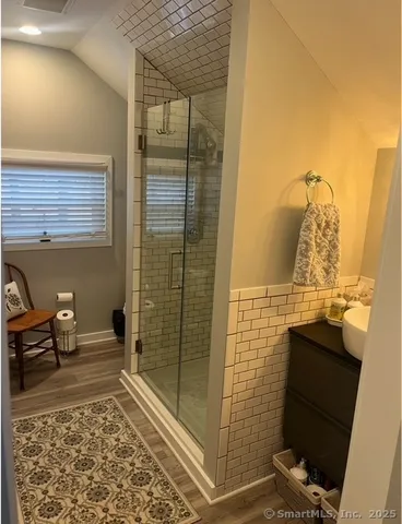 a bathroom with a sink and a shower