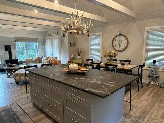 a room with lots of wooden furniture