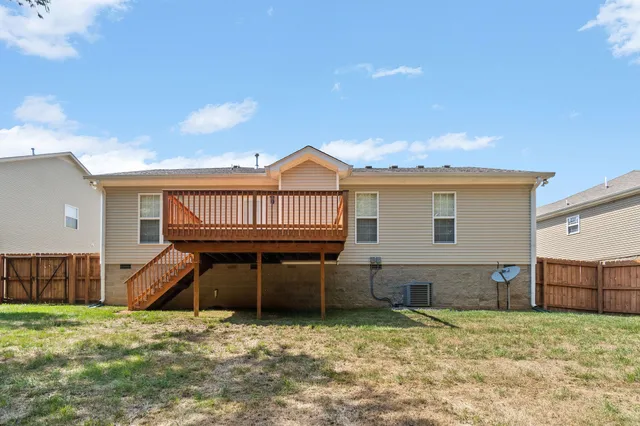 a house view with a backyard space