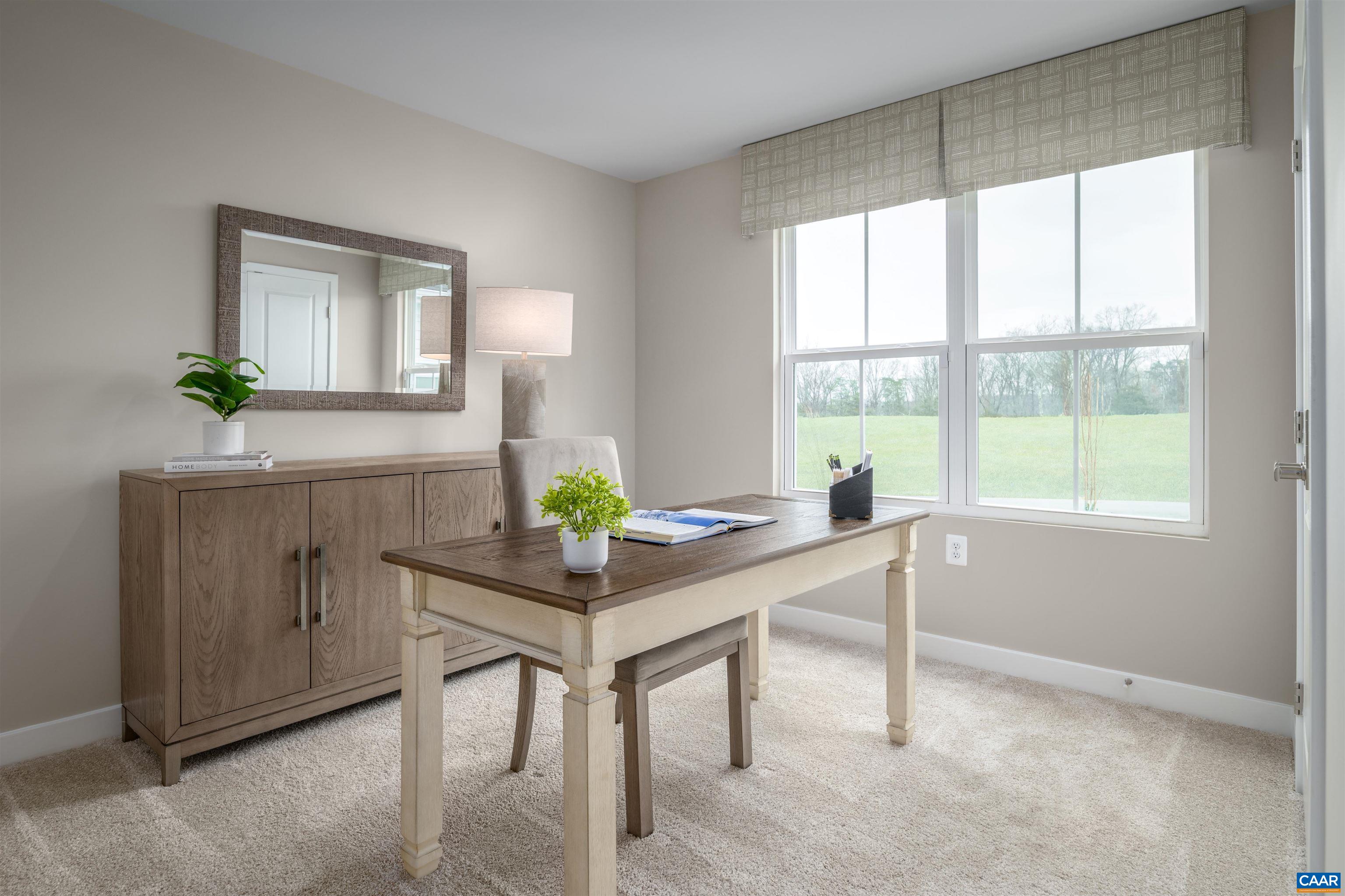 5137 Lazy Branch Lane Keswick, VA 22947 - Photo 6 of 13 a view of a workspace with furniture and a window